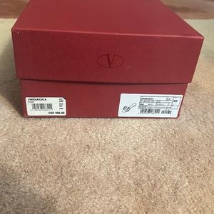 Brand new Valentino slides size 8 1/2 fits like a 8